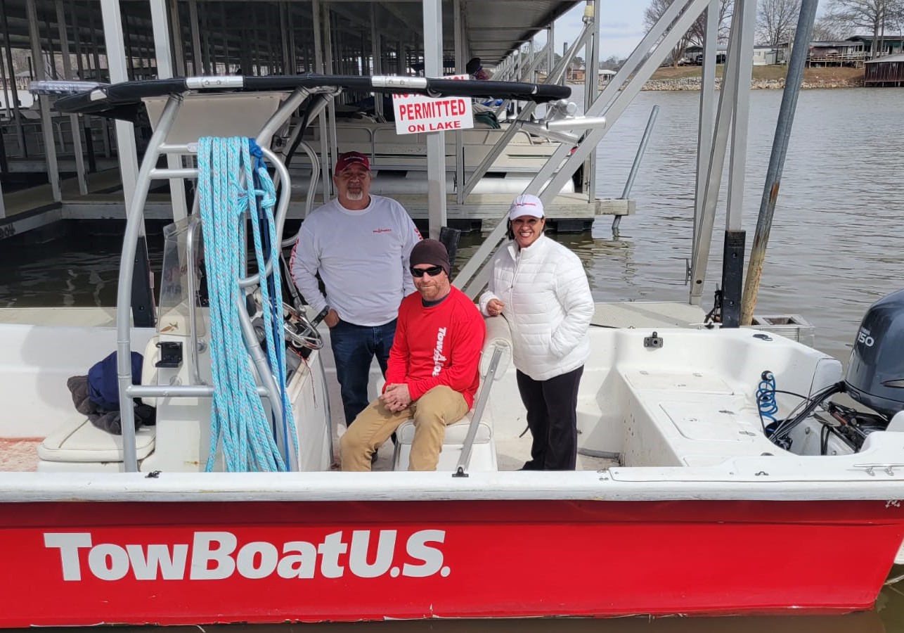 (L) Chris Rodriguez and (R) Janet Liciaga, new owners of TowBoatUS Weiss Lake, Alabama, with (C) port captain Bryson Dubsky.